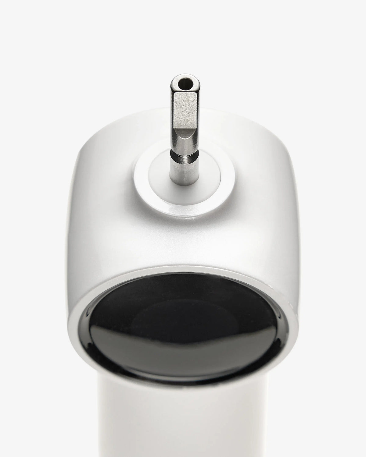 Close-up of the AirJet X5 electric toothbrush toothbrush with the brush head removed, showing the central airflow channel.
